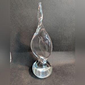 Clear crystal art glass sculpture, likely a paperweight or decorative figurine.
